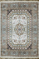 Safir Royal Medallion Rug with ivory base, detailed central medallion and ornate multicolor border