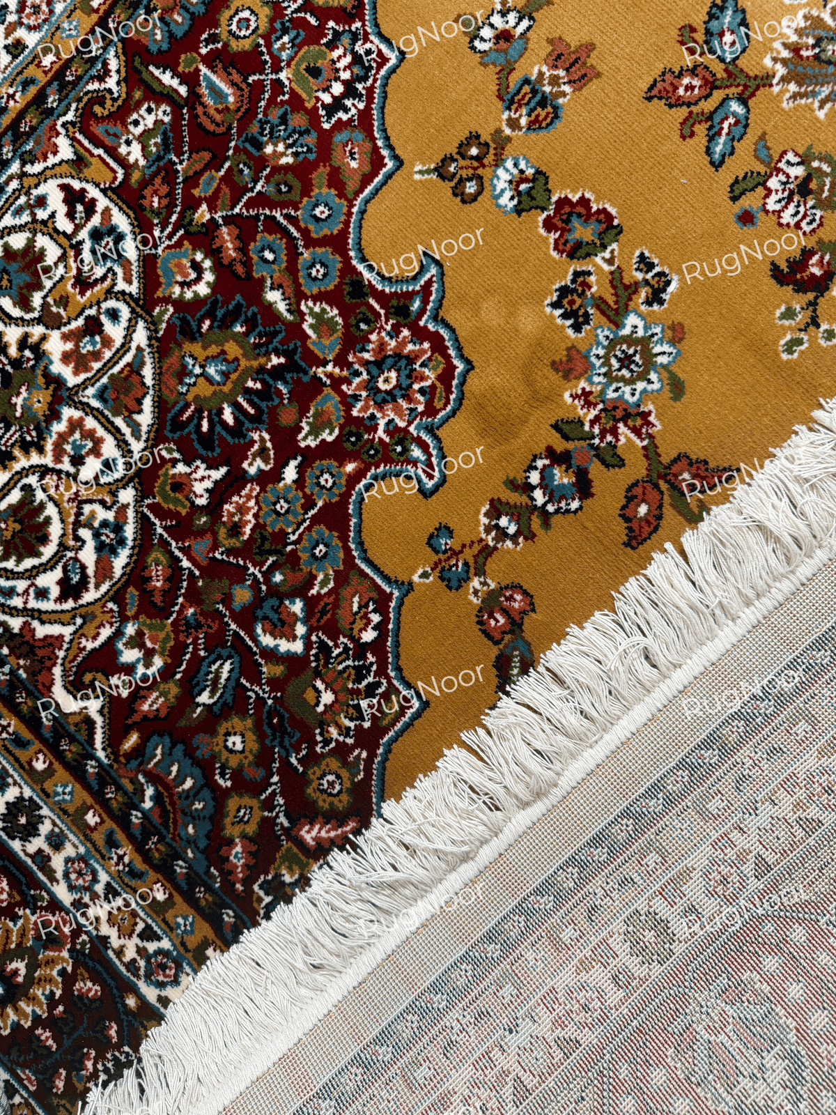 Ivory fringe and patterned underside along the edge of the mustard gold rug - Shams RugNoor