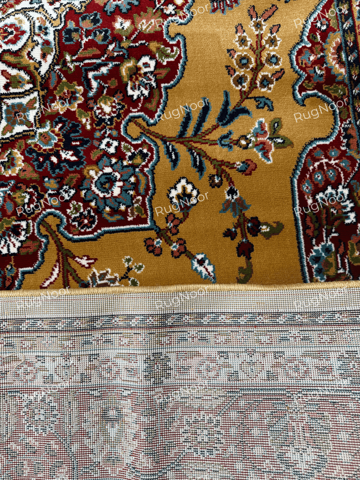Ivory fringe and patterned underside along the edge of the mustard gold rug - Shams RugNoor