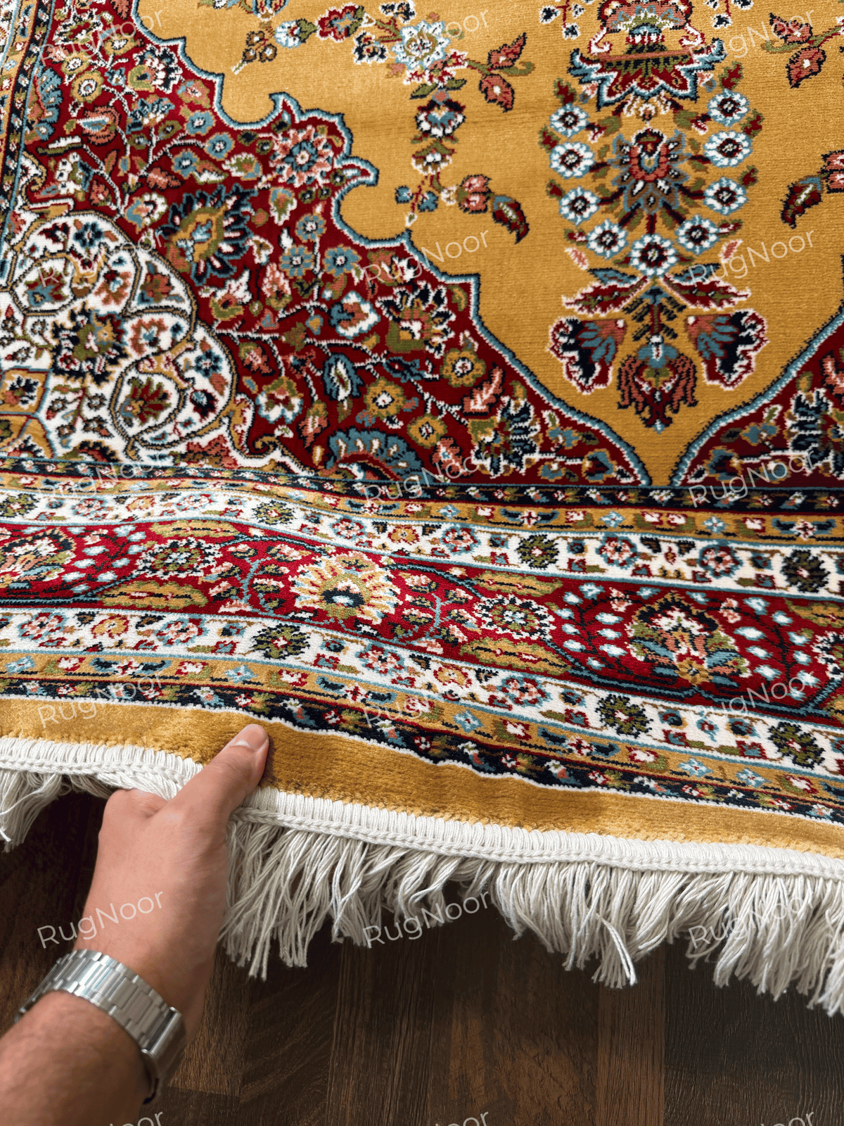Close-up of the burgundy floral border, mustard gold edge and ivory fringe - Shams RugNoor