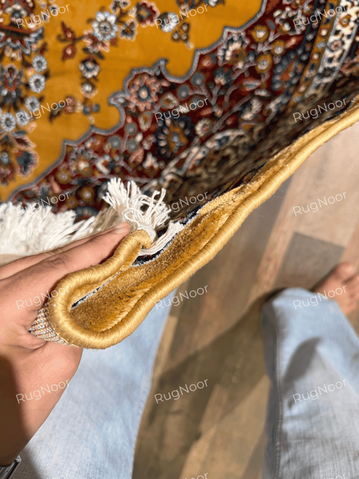 Folded mustard gold rug edge showing pile, binding and patterned underside - Shams RugNoor