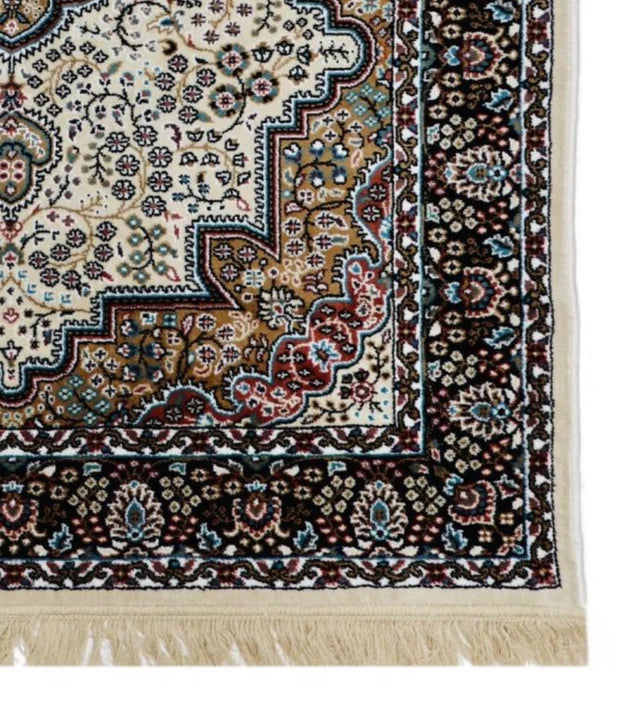 Soraya Royal Medallion Rug detail showing the central medallion, intricate motifs and cream field