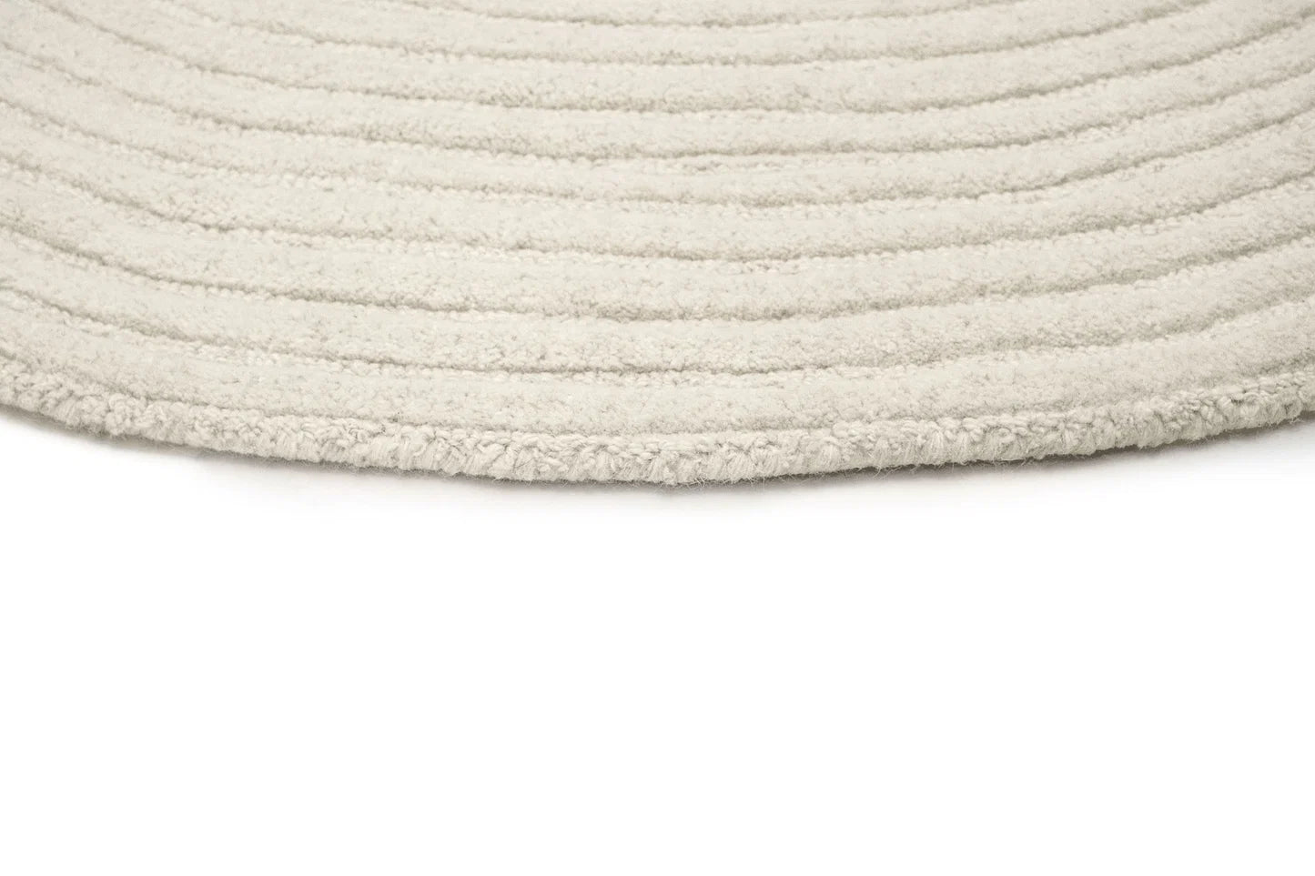 irregular white rug on a white background