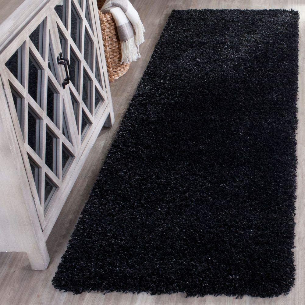 Black fluffy runner rug styled in hallway entrance - RugNoor