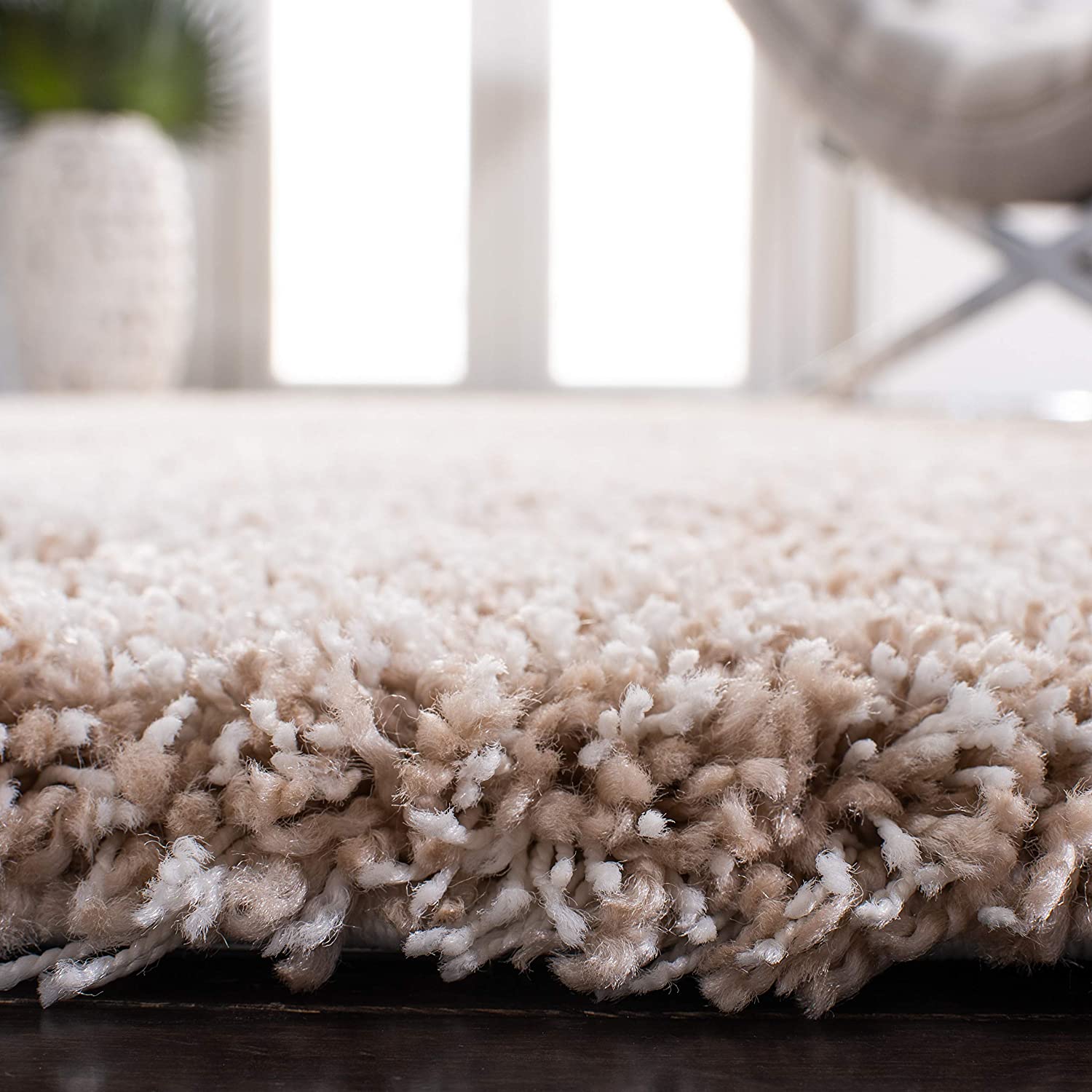 Beige shag rug close-up showing soft fluffy pile texture - RugNoor