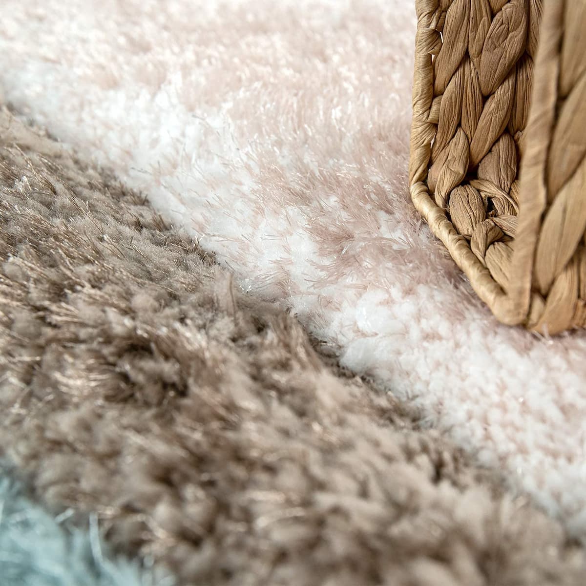 Soft ombre white to brown shag carpet texture by RugNoor, styled with rattan basket