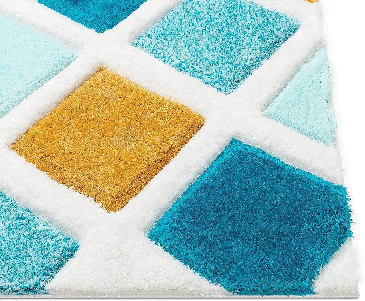 RugNoor corner close-up of blue and yellow diamond shag rug pile
