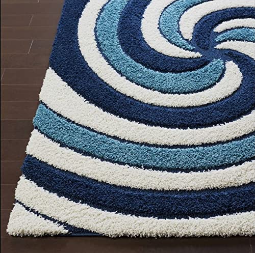 RugNoor navy blue and white swirl shag rug, corner view on wooden floor