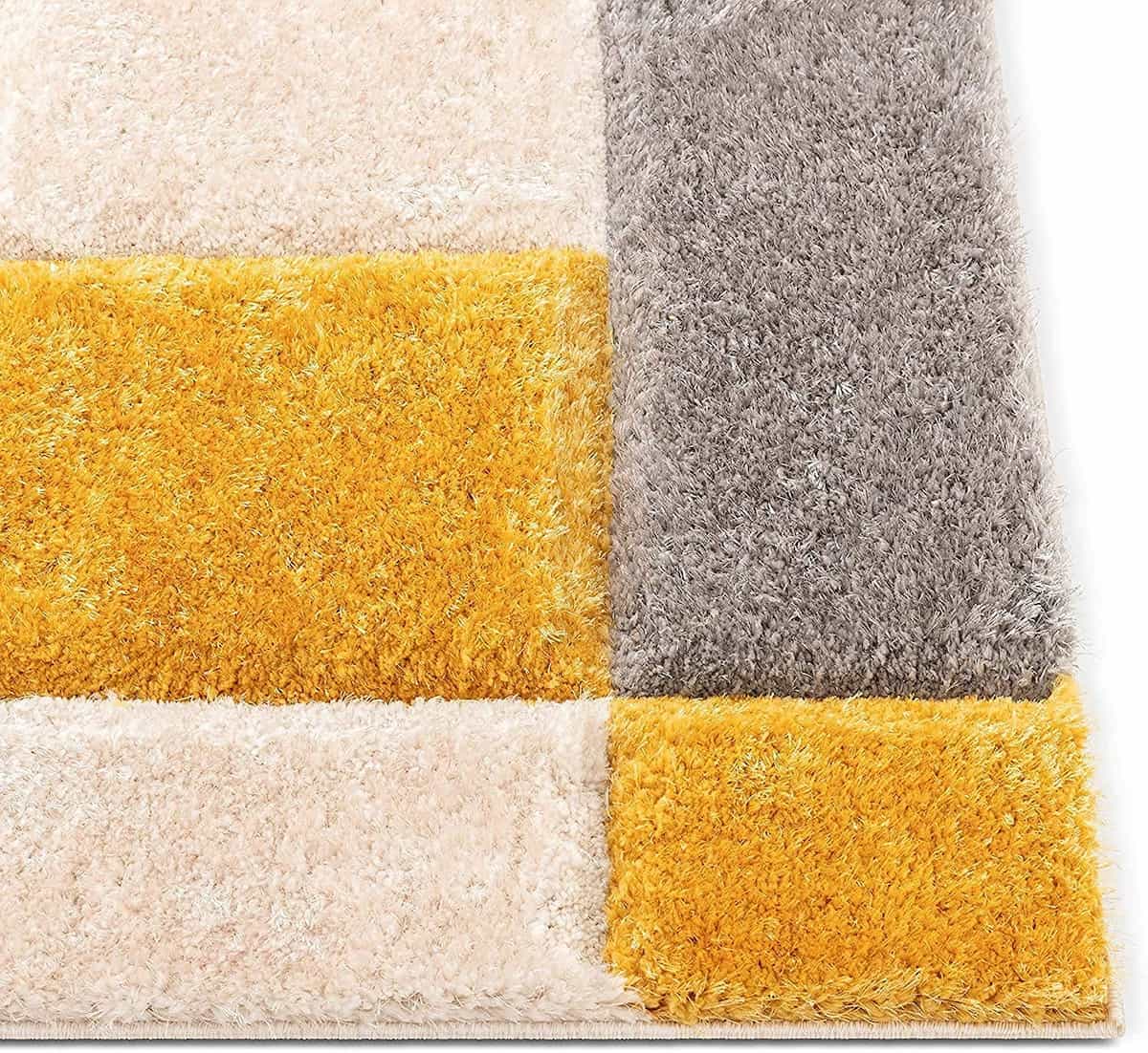 RugNoor corner view of yellow, grey and white block pattern shag rug