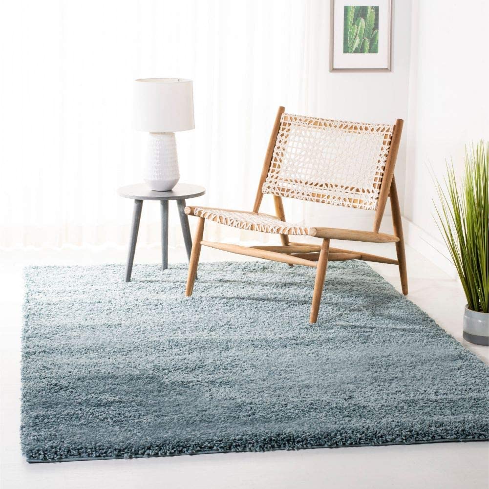 A light blue microfiber shaggy rug in a living room - RugNoor