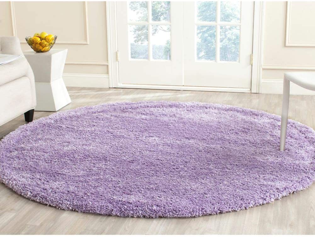 Round lilac shag rug in bright living room setting - RugNoor