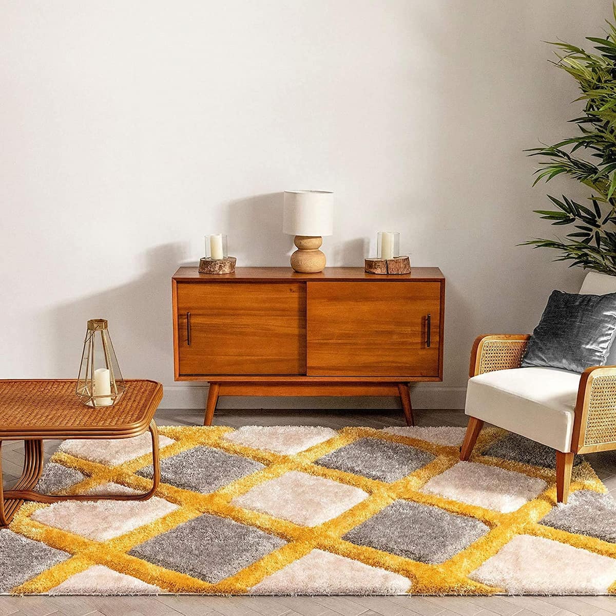 Diamond-cut shag carpet in yellow and silver beneath a wooden console table
