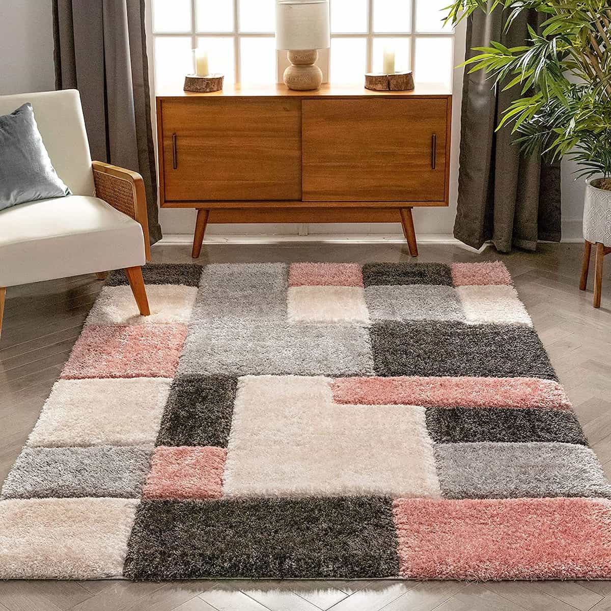 RugNoor pink and grey checkered shag rug in a bright living room