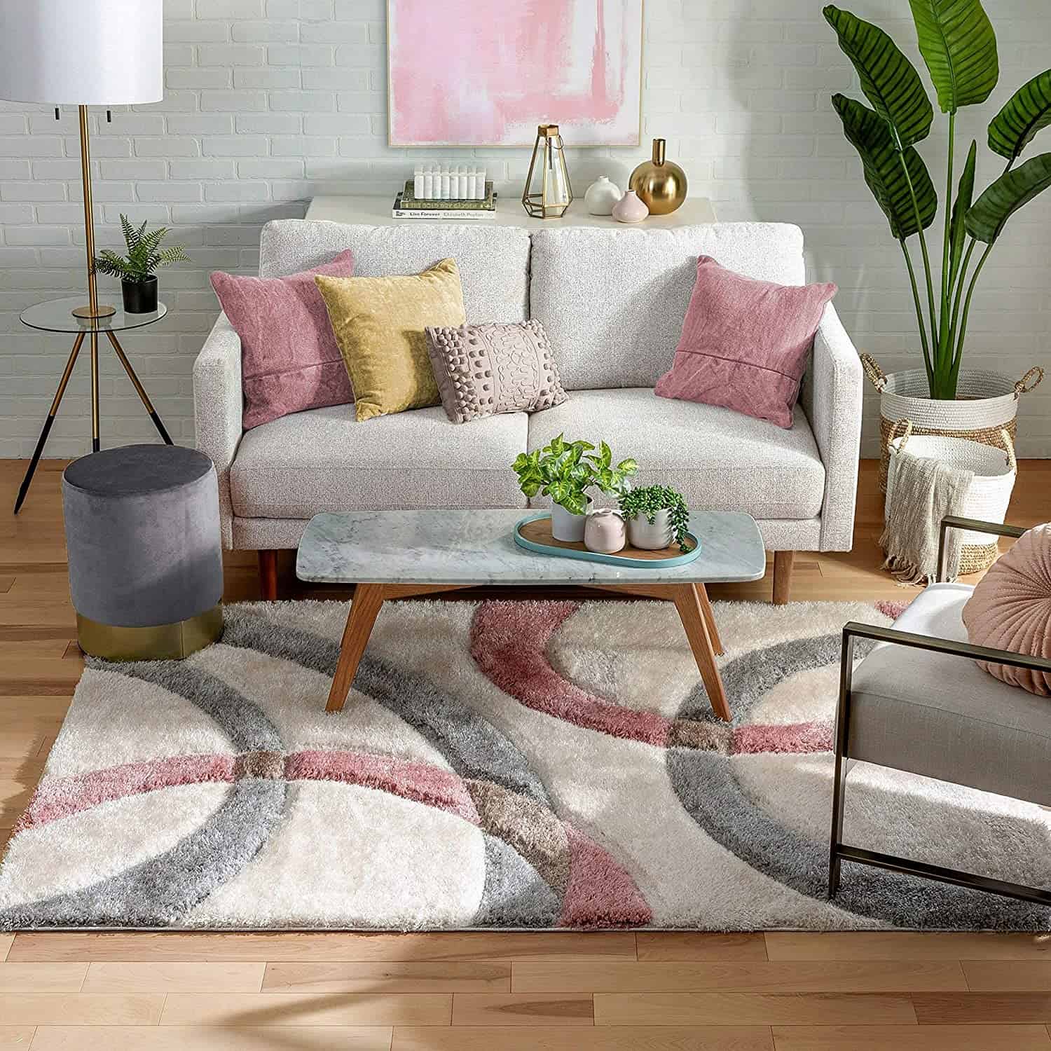 RugNoor pink and grey ring pattern shag rug styled in a cozy living room