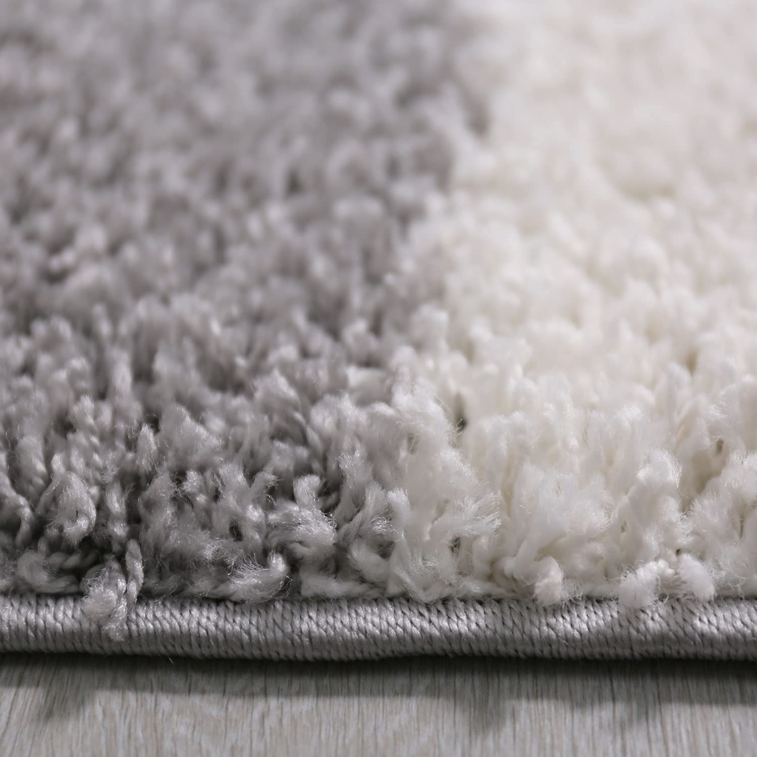 RugNoor close-up grey white shag rug pile texture, soft fluffy carpet
