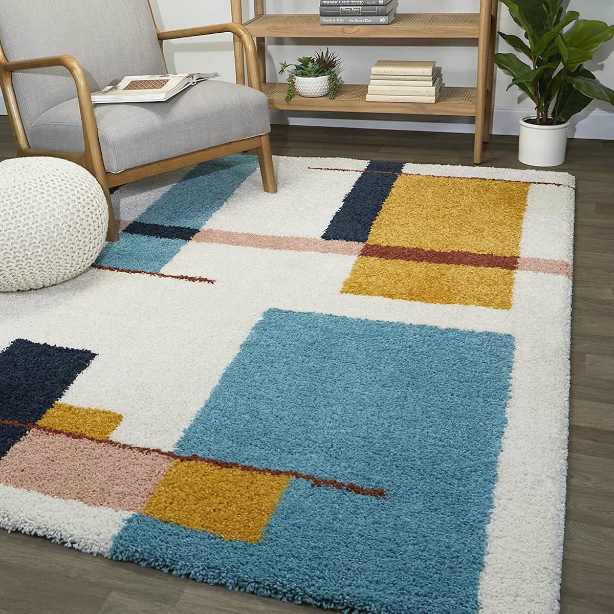 RugNoor's multicolored microfiber shaggy rug with geometric patterns in a living room setting.