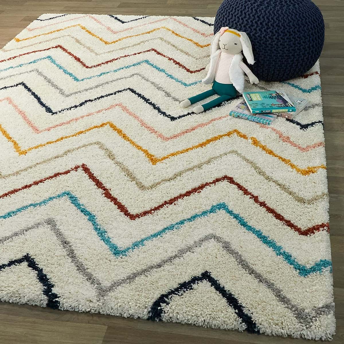 White zigzag chevron shag rug with multicolor stripes in kids room, RugNoor thick-pile carpet